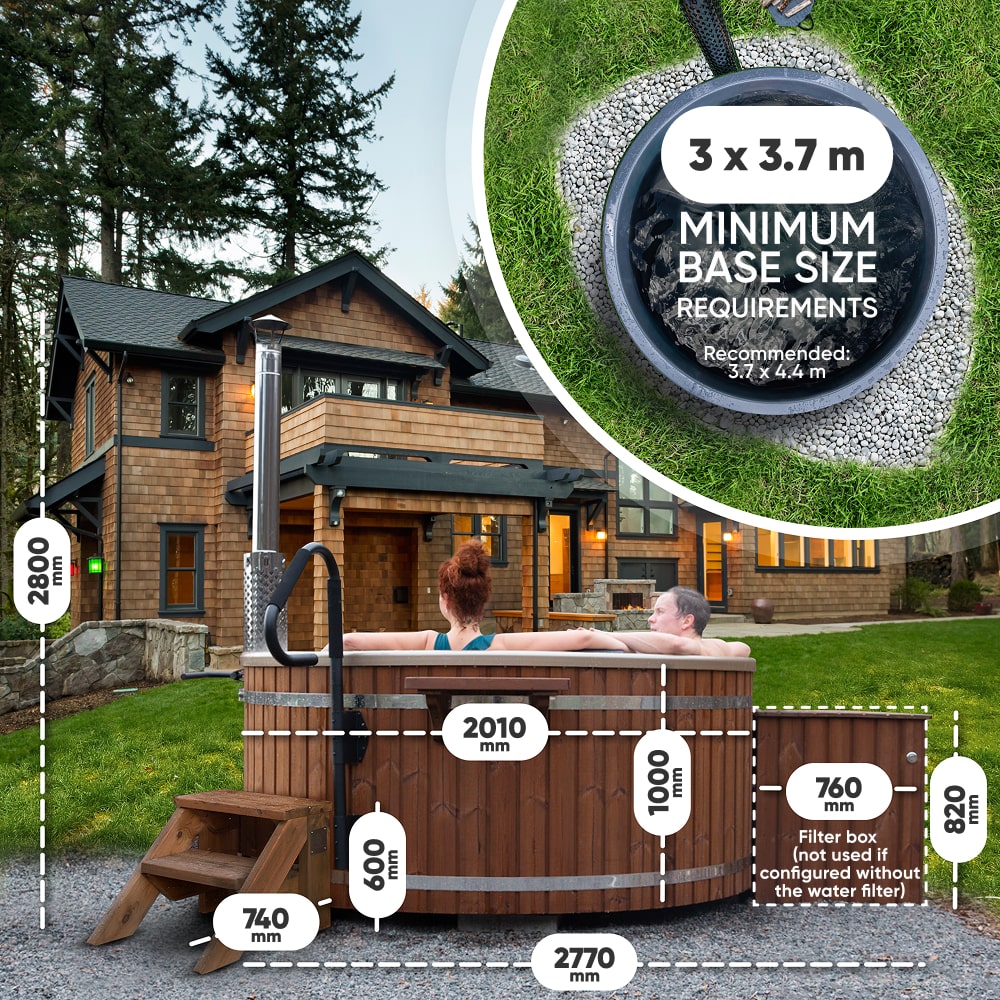 Outdoor view of wood fired hot tub with dimensions, steps, filter box, and chimney next to large house and lawn